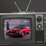 Car commercial on a vintage TV set