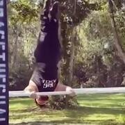Man doing gymnastics on parallel bars