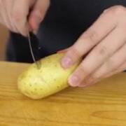 Potato being cut