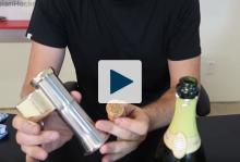 Taras holding a champagne opener