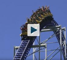 Roller coaster climbing hill