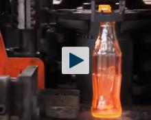 Red hot glass Coke bottle