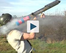 Man shooting fireworks from a homemade launcher