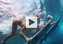 Two women on surf boards