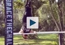 Man doing gymnastics on parallel bars