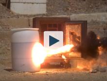 A safe door being pierced by explosives 