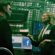 Woman giving a man money
