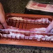 A bacon cooker gadget