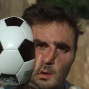 Dan getting hit in the face by a ball