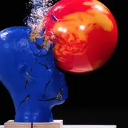 Bowling ball hitting blue head