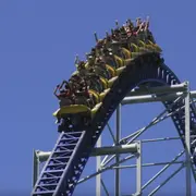 Roller coaster climbing hill