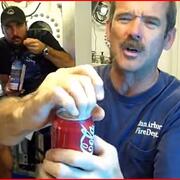 Hadfield opening a soda
