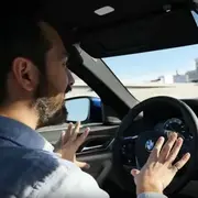 Man behind wheel of a self-driving car