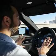 Man behind wheel of a self-driving car