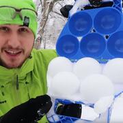 Taras Kul holding a snowball gadget