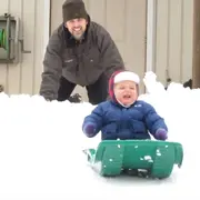 Toddler sledding