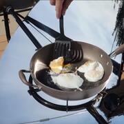 Eggs being cooked on a solar grill