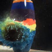 Paint filled vase exploding