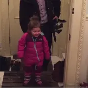 Little girl in snow boots